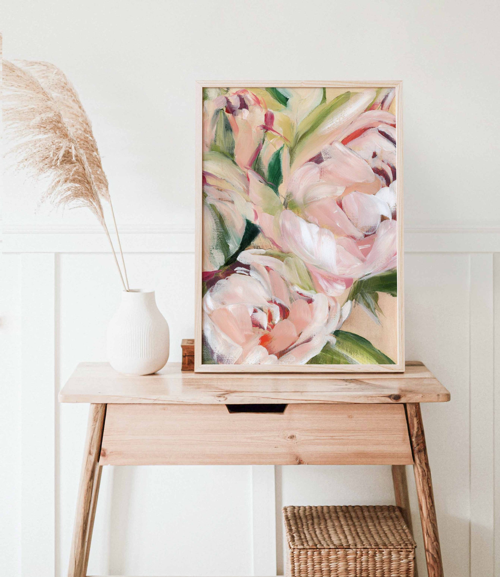 framed floral art print on tiny desk